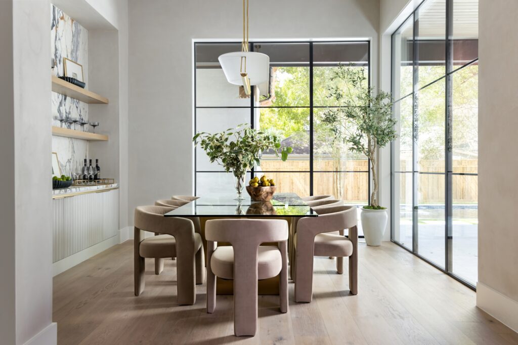 The dining room is gifted with bountiful light from generous windows. (Photo by Laurie Perez)
