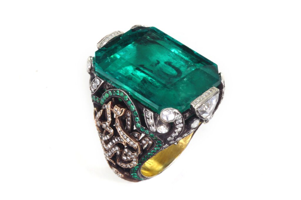 Sevan Biçakçi Divine Signature ring with gold, silver, diamonds, and an emerald engraved with the inscription “Allah” using the reverse intaglio technique, price upon request, at Stanley Korshak, Dallas; Magnolia City Jewelers, Houston; Korman Fine Jewelry, Austin; Sevan Biçakçi boutique, Miami. 
