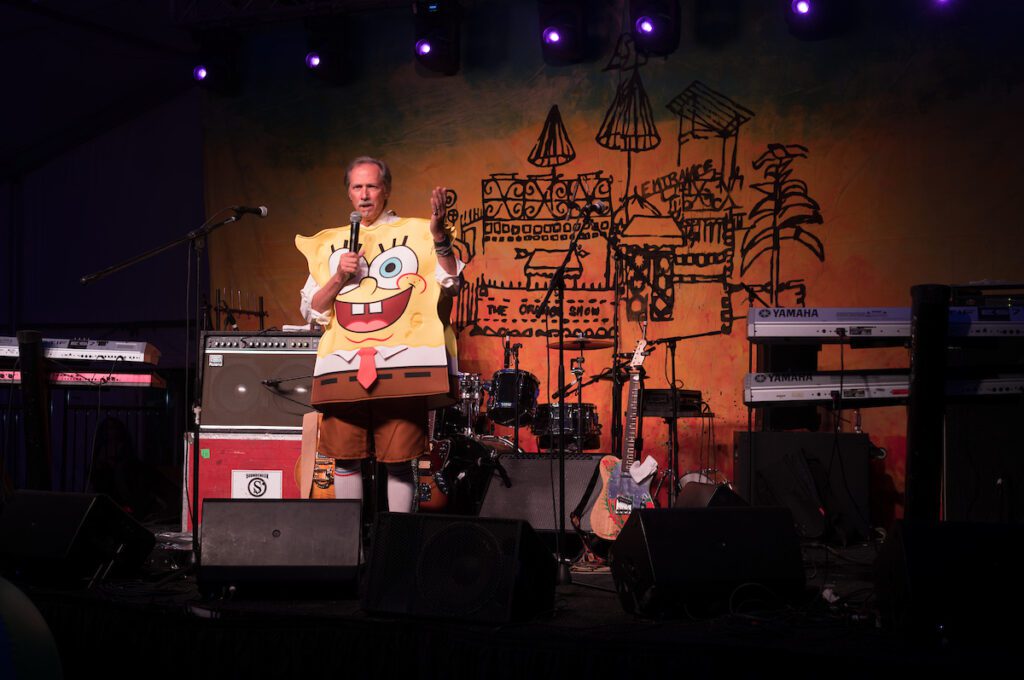 Executive director Jack Massing inspires the nautical crowd at Orange Show Barefoot Beach Ball (Photo by Daniel Ortiz)