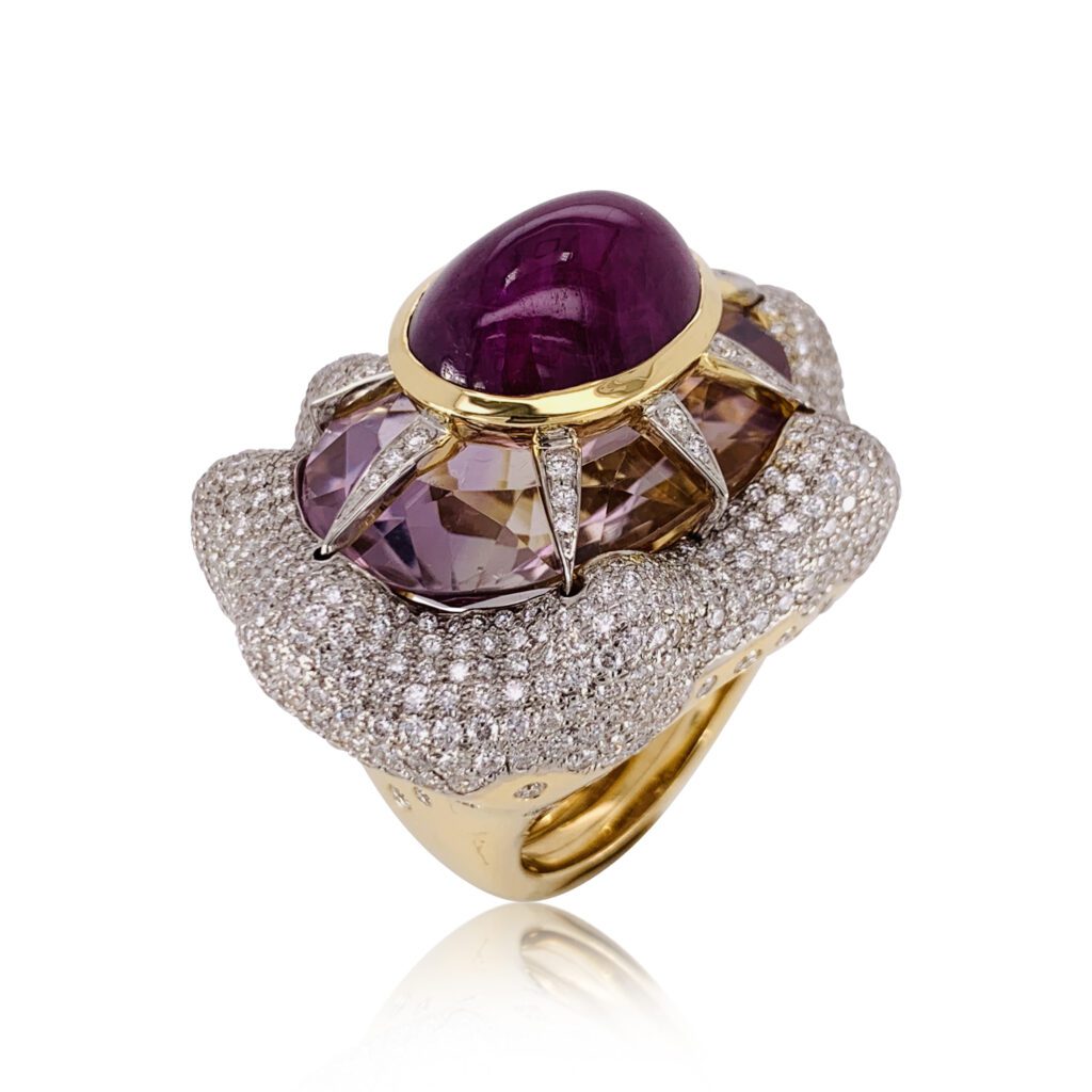 Hutton Wilkinson for Tony Duquette ring in 18K gold with pink amethyst, ruby, and diamond, price upon request, at Neiman Marcus, Dallas; Saks Fifth Avenue, Houston; Cayen Collection, Carmel-by-the-Sea; Marissa Collections, Palm Beach.