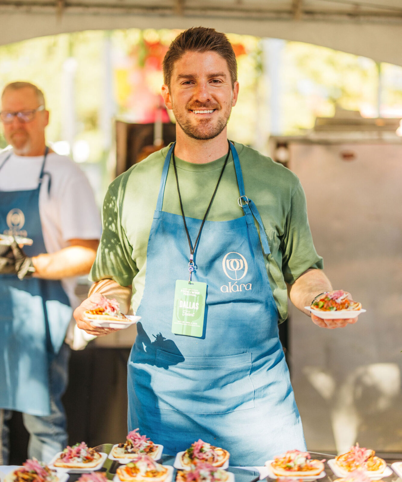 Alara Chef/Owner Onur Akan serving chicken kebab pitas at Chefs for Farmers. (Photo by Chase Hall)