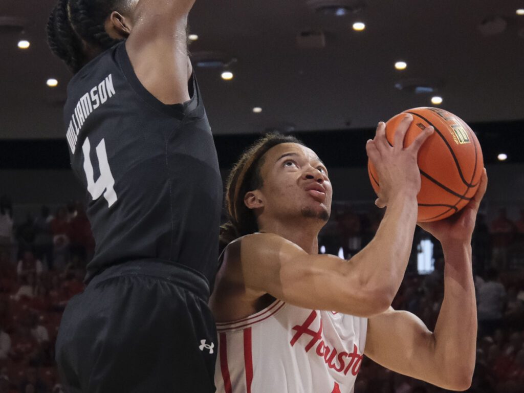 University of Houston point guard Kingston Flemings isn't afraid to attack the rim. (Photo by F. Carter Smith)