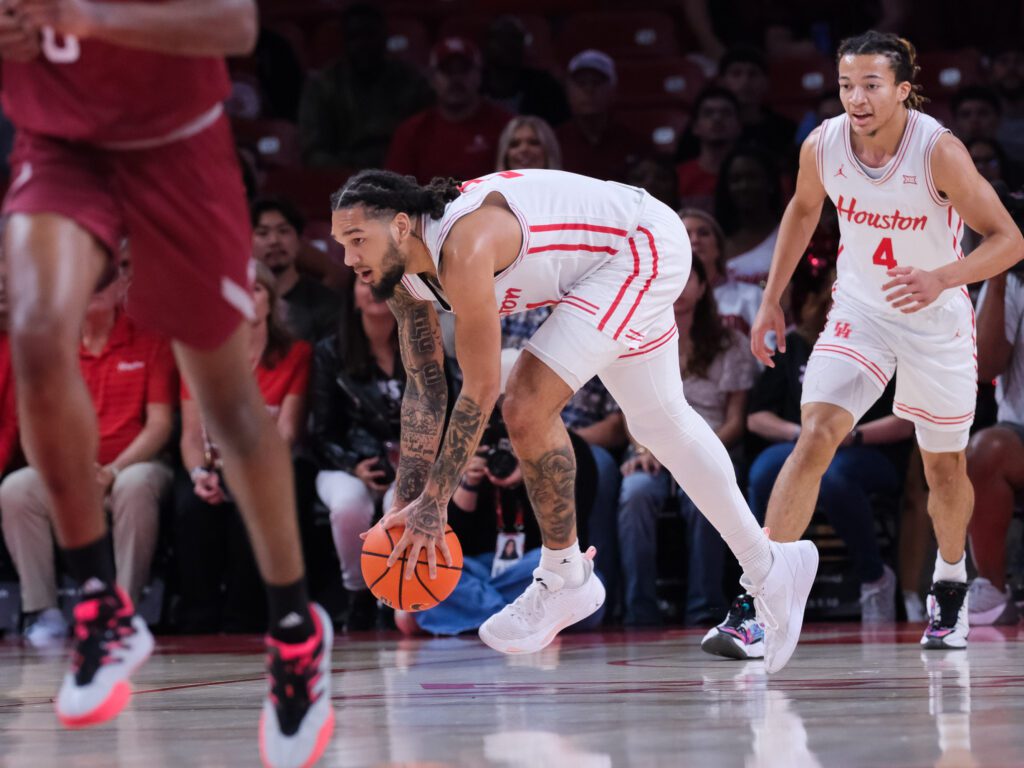 University of Houston guard Emanuel Sharp showing off his moves to the basket. (Photo by F. Carter Smith)