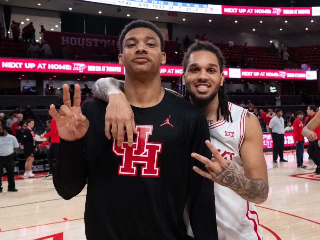 University of Houston senior guard Emanuel Sharp has taken redshirting true freshman Bryce Jackson under his wing. (Photo by F. Carter Smith)