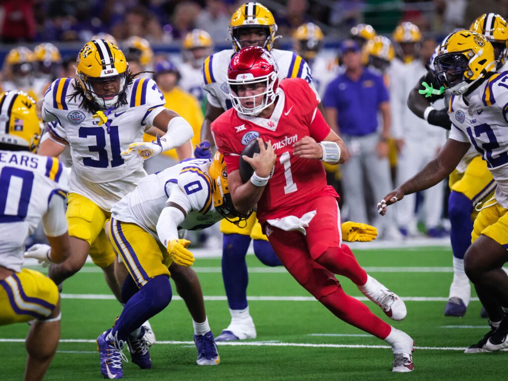 University of Houston quarterback Conner Weigman just kept coming at LSU. (Photo by F. Carter Smith)