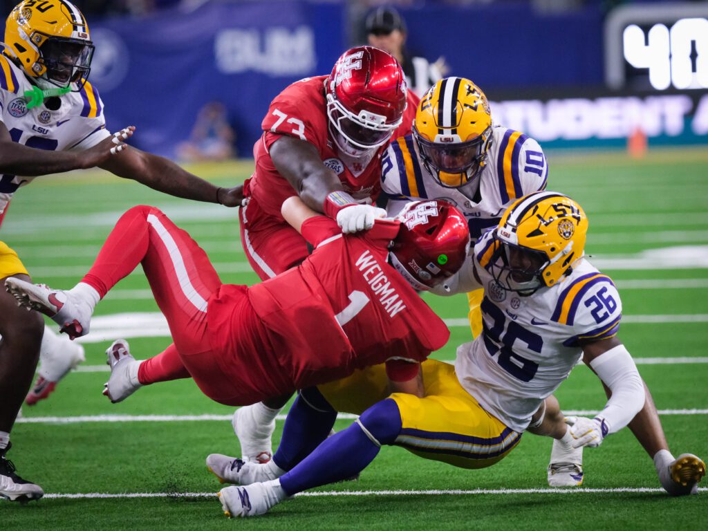 University of Houston quarterback Conner Weigman and these Cougars never stopped fighting. (Photo by F. Carter Smith)
