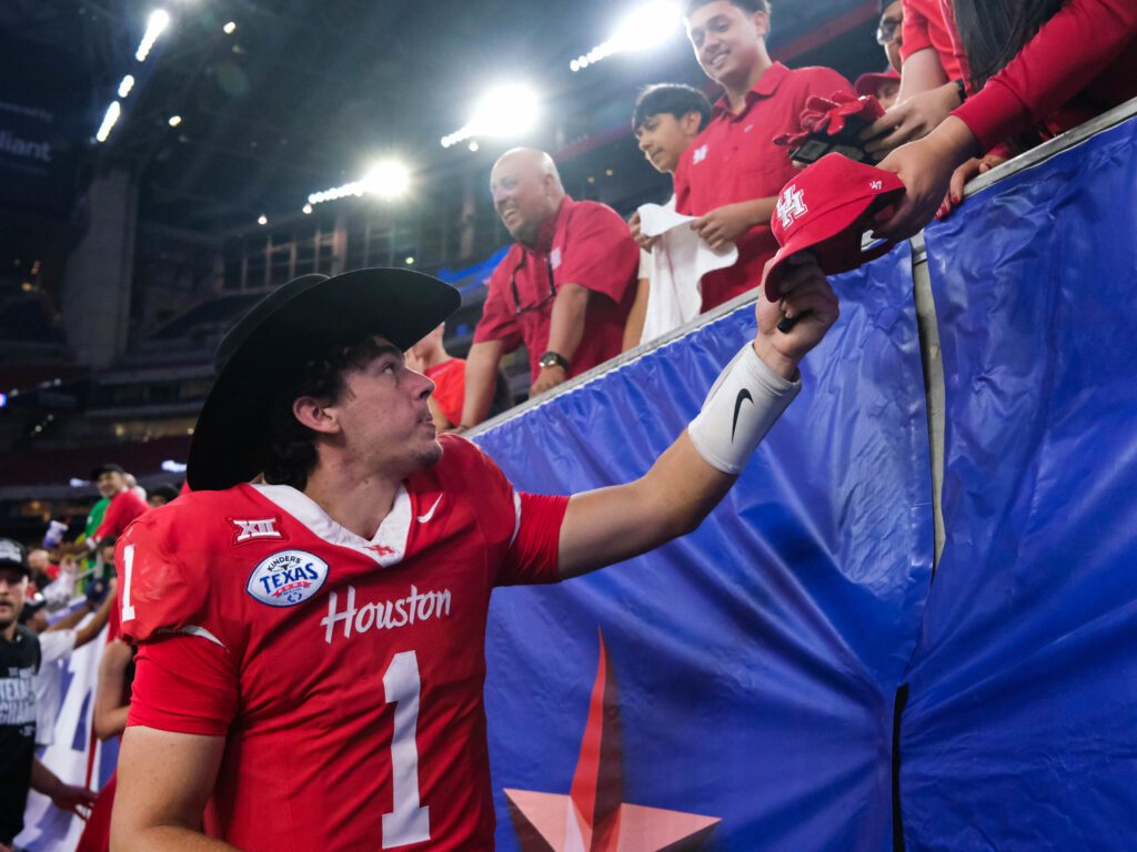 University of Houston quarterback Conner Weigman isn't riding off into the sunset just yet. He is coming back to be the starter next season. (Photo by F. Carter Smith)