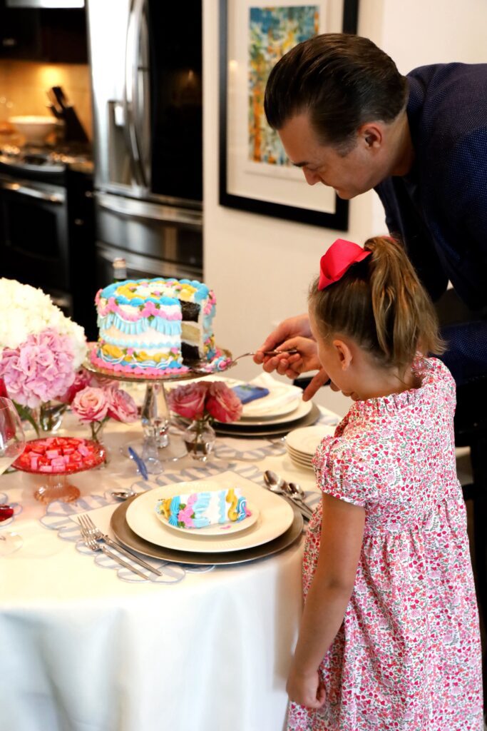 Blayke learns to cut the cake before the class session so she can be the perfect birthday party host. 
