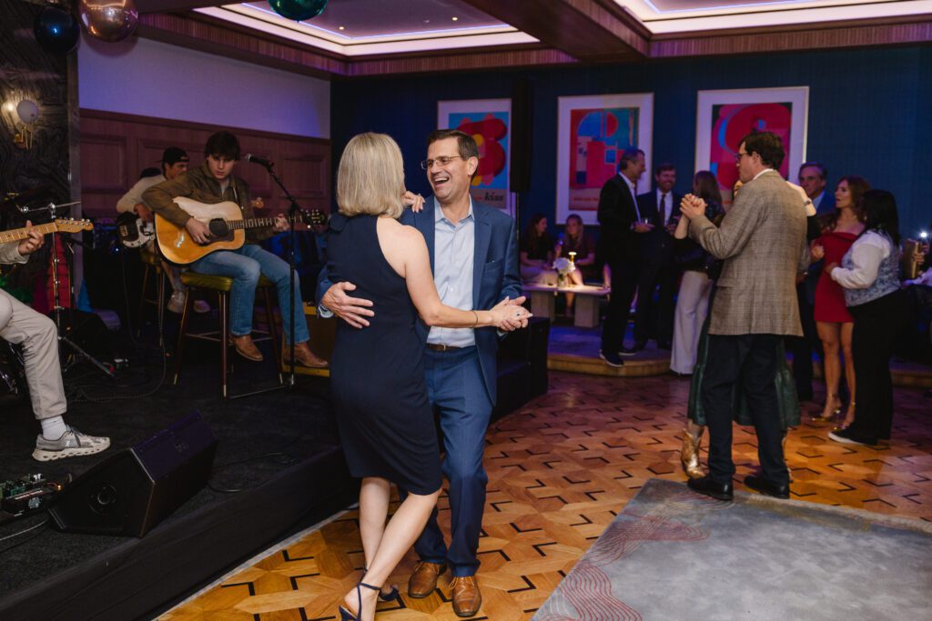 Heather & Kevin Faske swing to the sounds of the Down Hazy Band at the Ambassadors for Texas Children’s Hospital Houston Holiday Party   (Photo by Jenny Antill/Texas Children's Hospital)