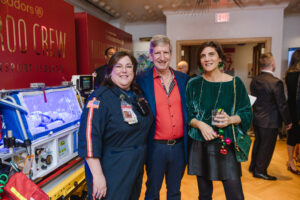 Kangaroo Crew team member with Ralph Weber and Pediatrician in Chief, Lara S. Shekerdemian (Photo by Jenny Antill/Texas Children's Hospital)