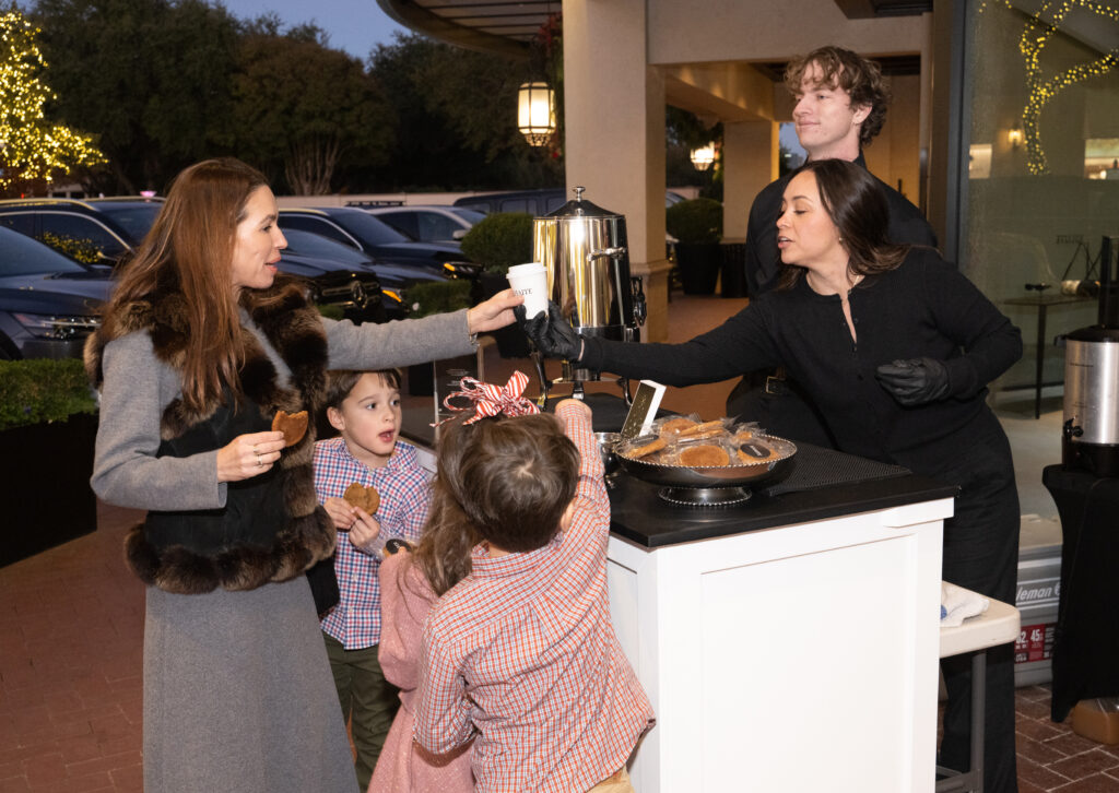 KHAITE's holiday service cart whipped up hot spiced cider and ginger molasses cookies. (Photo by George Fiala)