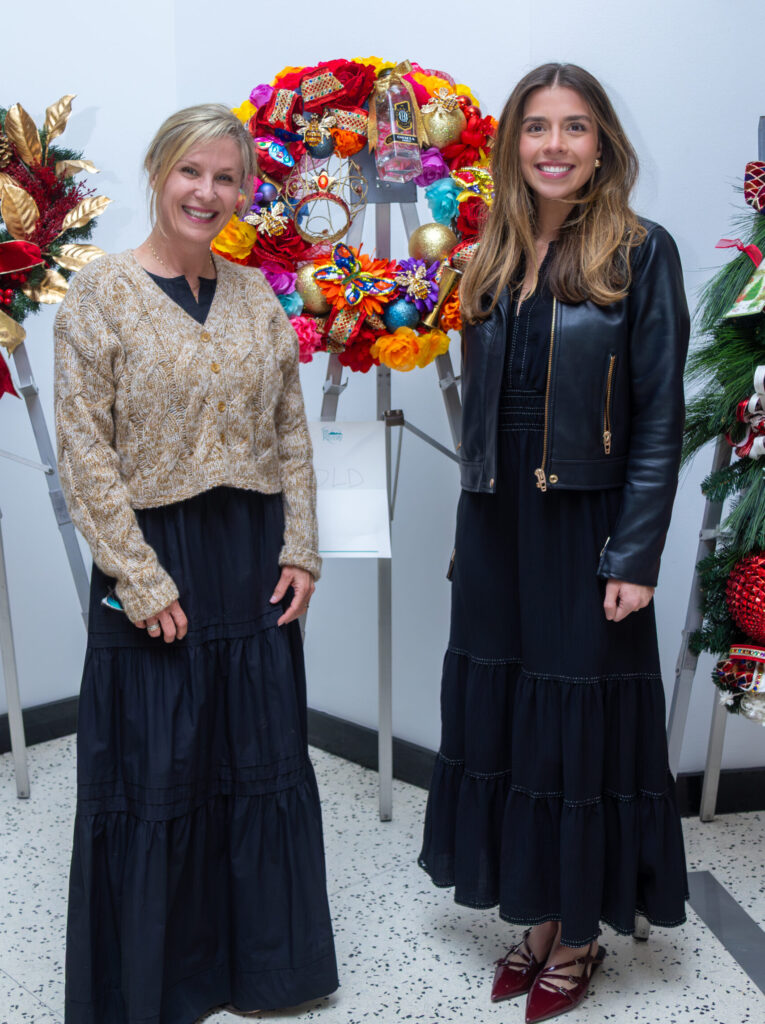Kim Martin, Vivian Vance at the Decorative Center Houston  holiday wreath event benefiting the Salvation Army