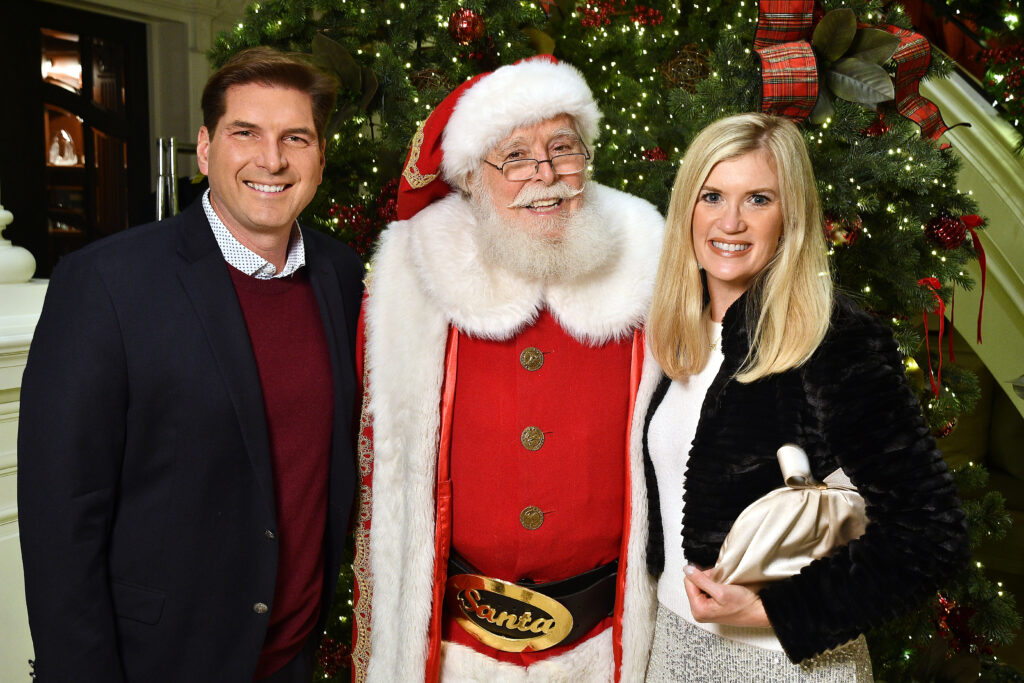 David & Nicole Durham with Santa at 'Santa's Elves'