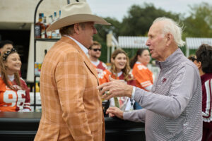 Pete Bell with legendary former Texas A&M coach R.C. Slocum at the Cotton Tailgate; photo courtesy of Cotton Holdings
