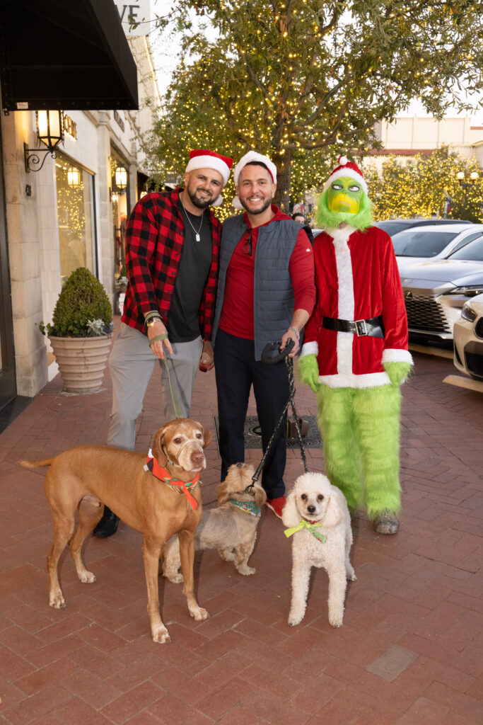 Sal Musleh, Mario Rivera, Mr. Grinch (Photo by George Fiala)