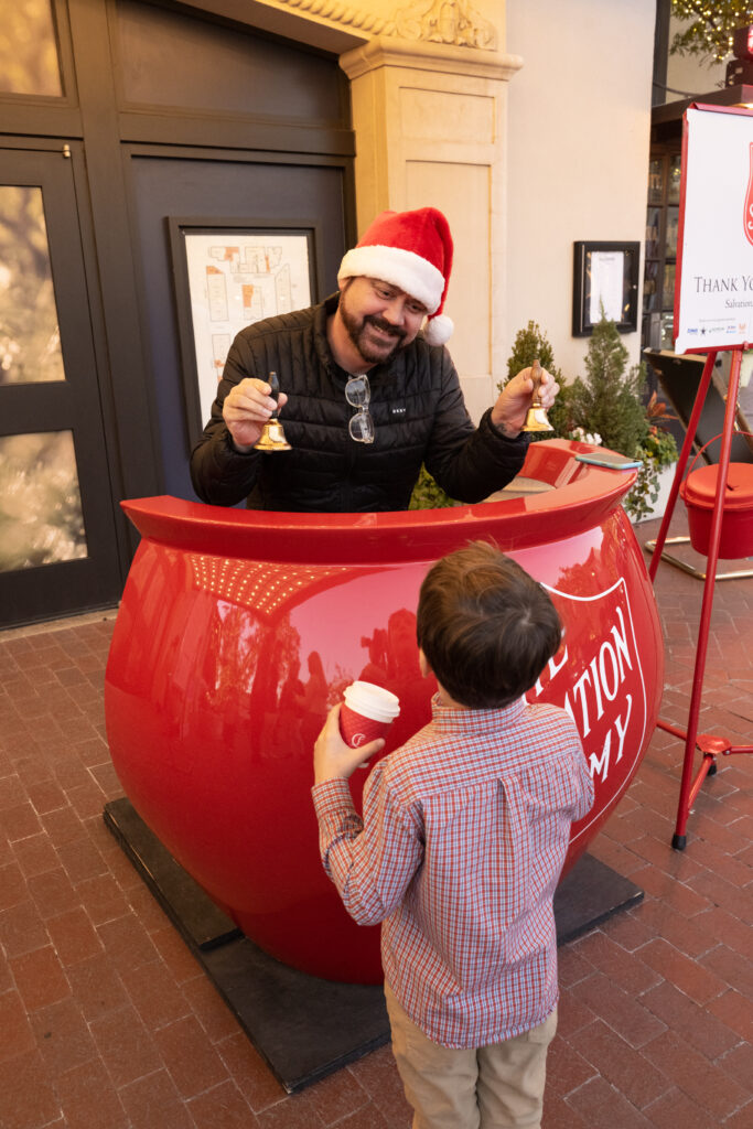 Ringing the bell with The Salvation Army (Photo by George Fiala)