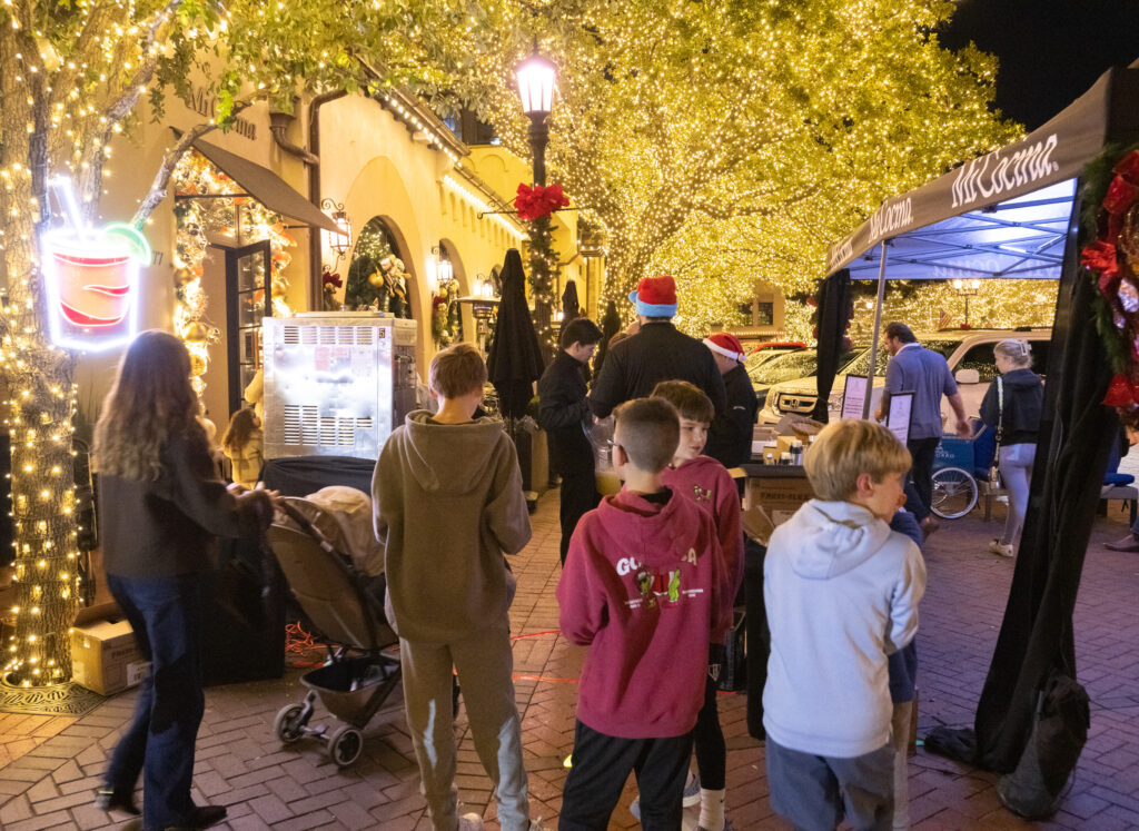 Families particularly love making the Christmas Lights Celebration and Shopping Stroll part of their holiday tradition because merry surprises await children around every corner. (Photo by George Fiala)