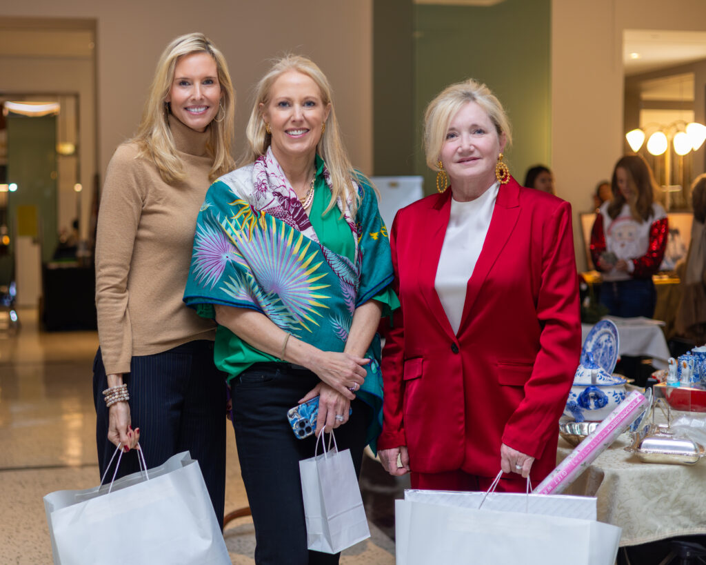 Tricia Ayers, Karen Turbidy, Christi Rowland at the Decorative Center Houston holiday wreath event benefiting the Salvation Army