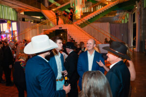 Ucross Gala – Guests mingle in POST Houston atrium