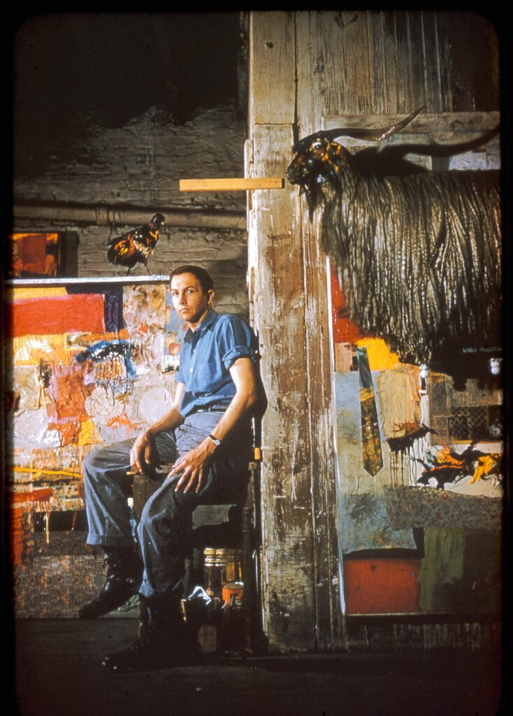 Robert Rauschenberg with "Satellite," 1955, and the first state of "Monogram," 1955–1959 (first state 1955–1956) in his Pearl Street studio, New York, New York, circa 1955. (Robert Rauschenberg Foundation Archives, New York)
