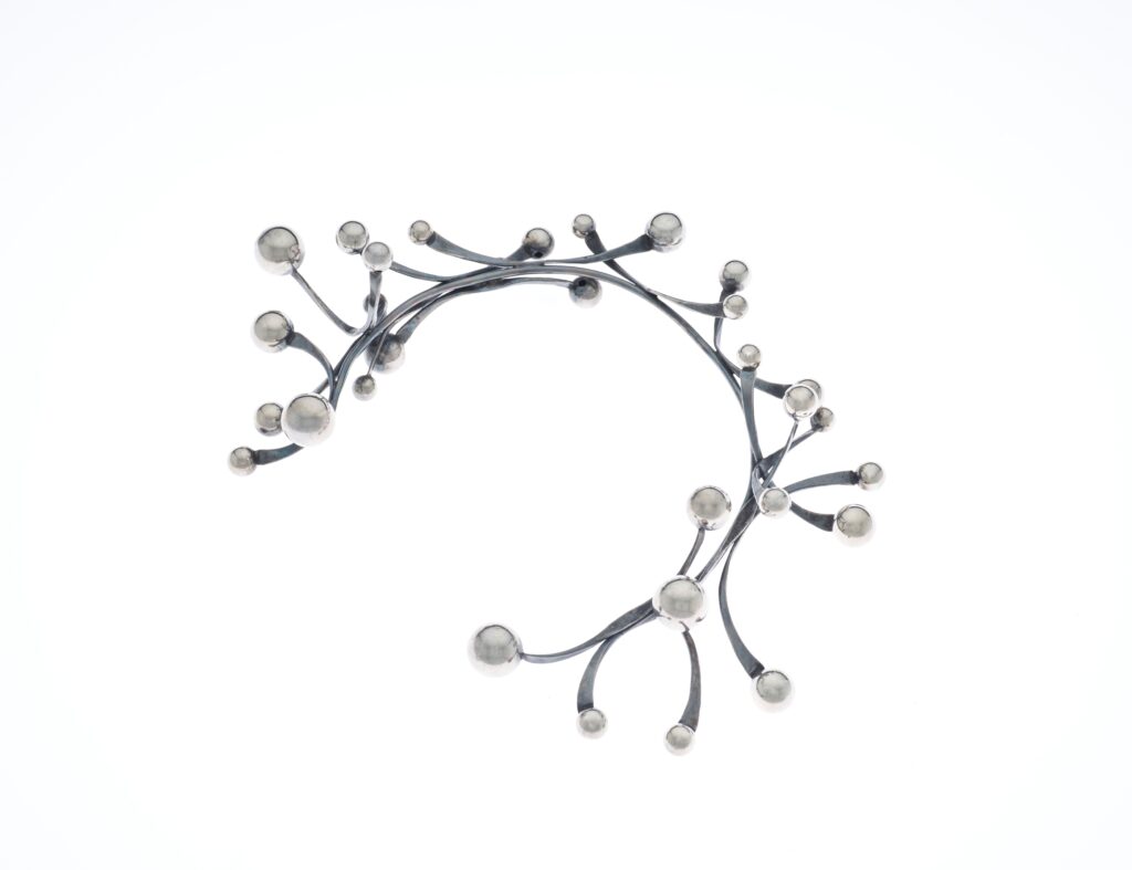 Art Smith's Galaxy neckpiece, circa 1962. (© Smithsonian National Museum of African American History and Culture. Photo by Chad Redmon.)