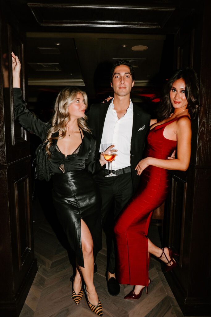 Vandelay Group’s Enrique Martinez is flanked by representatives of adult beverage companies at the new Maître D.