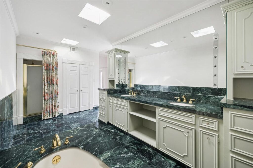 The elegant primary bath at 200 Westmoreland (Photo by TK Images)