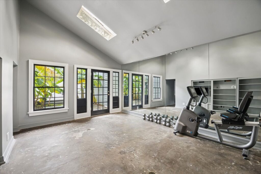 The pool house with bath and kitchen could be used as additional quarters at 200 Westmoreland (Photo by TK Images)