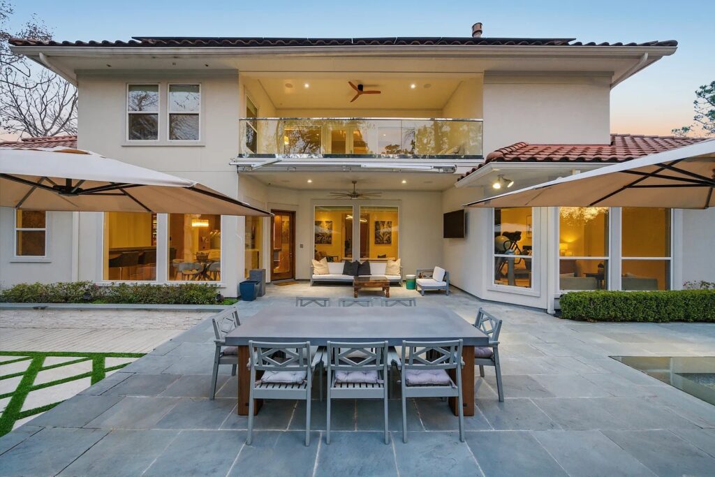 The backyard at 3 Farington Way is sleek, modern, and upscale. 