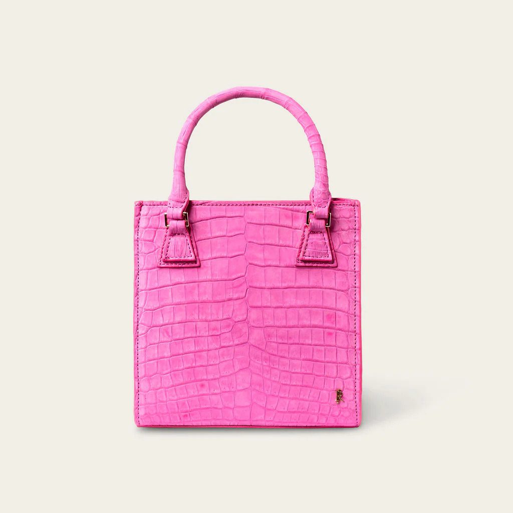 Our favorite Jenya Renée handbags include the Tessa Nile Crocodile Velvet Rose Nubuck (shown here) and Ella Nile Crocodile Peony Pink. (Courtesy)
