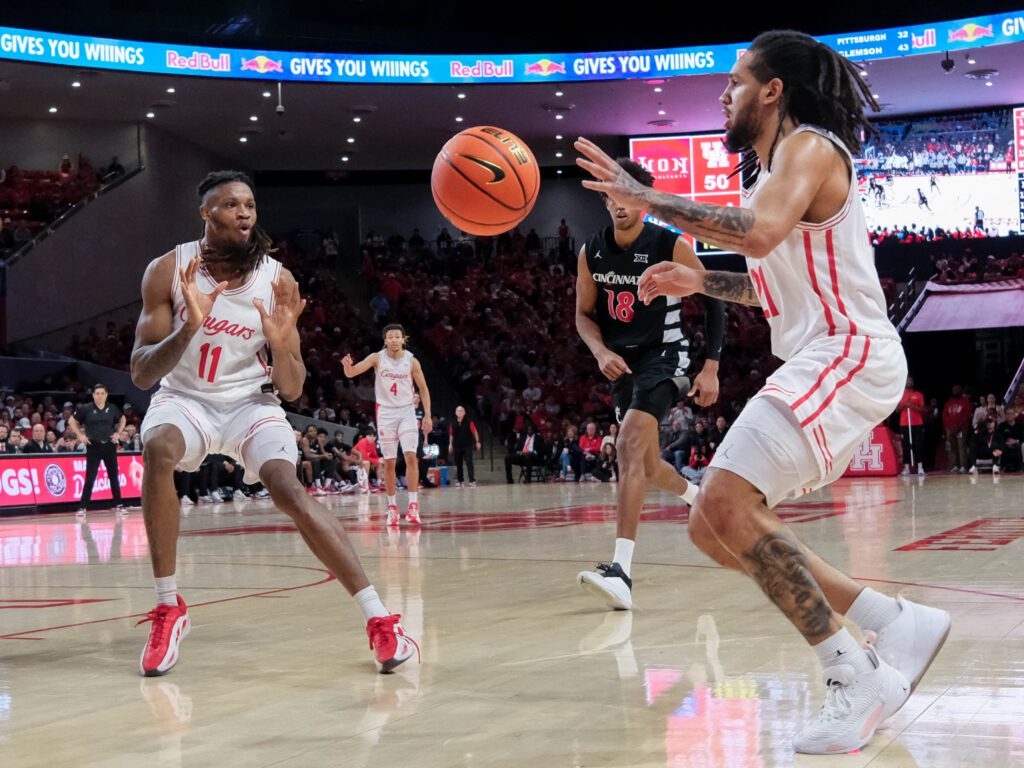 When Kelvin Sampson's University of Houston team moves the ball and Emanuel Sharp gets an open shot, good things happen. (Photo by F. Carter Smith)