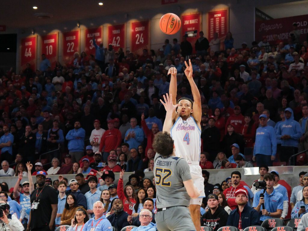University of Houston point guard Kingston Flemings is leading a University of Houston power flex. (Photo by F. Carter Smith)