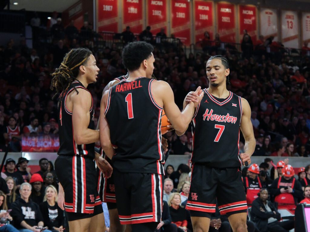 Kingston Flemings. Chase McCarty and Milos Uzan know this UH backcourt is beyond deep. (Photo by F. Carter Smith)