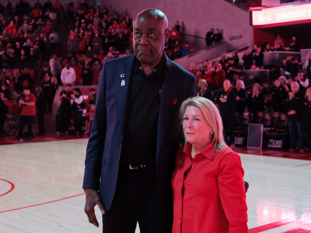 Dwight Davis and his wife Gayle enjoyed an emotional moment as the UH great's jersey was retired. (Photo by F. Carter Smith)