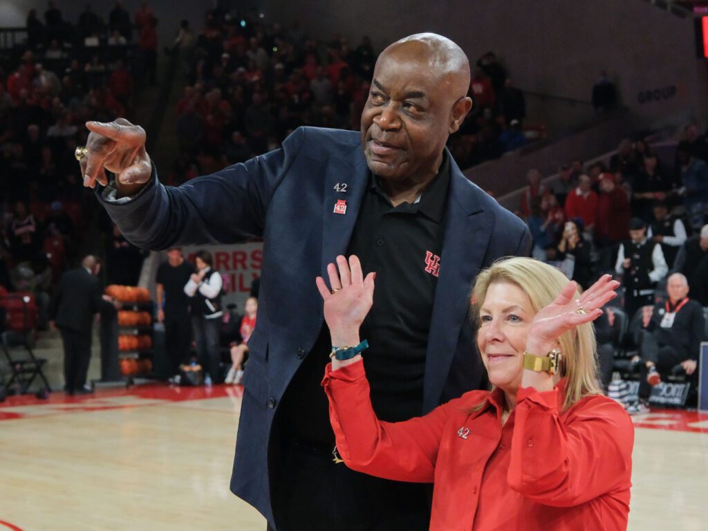 All-time UH great Dwight Davis and his wife Gayle enjoyed No. 42's long-awaited moment. (Photo by F. Carter Smith)
