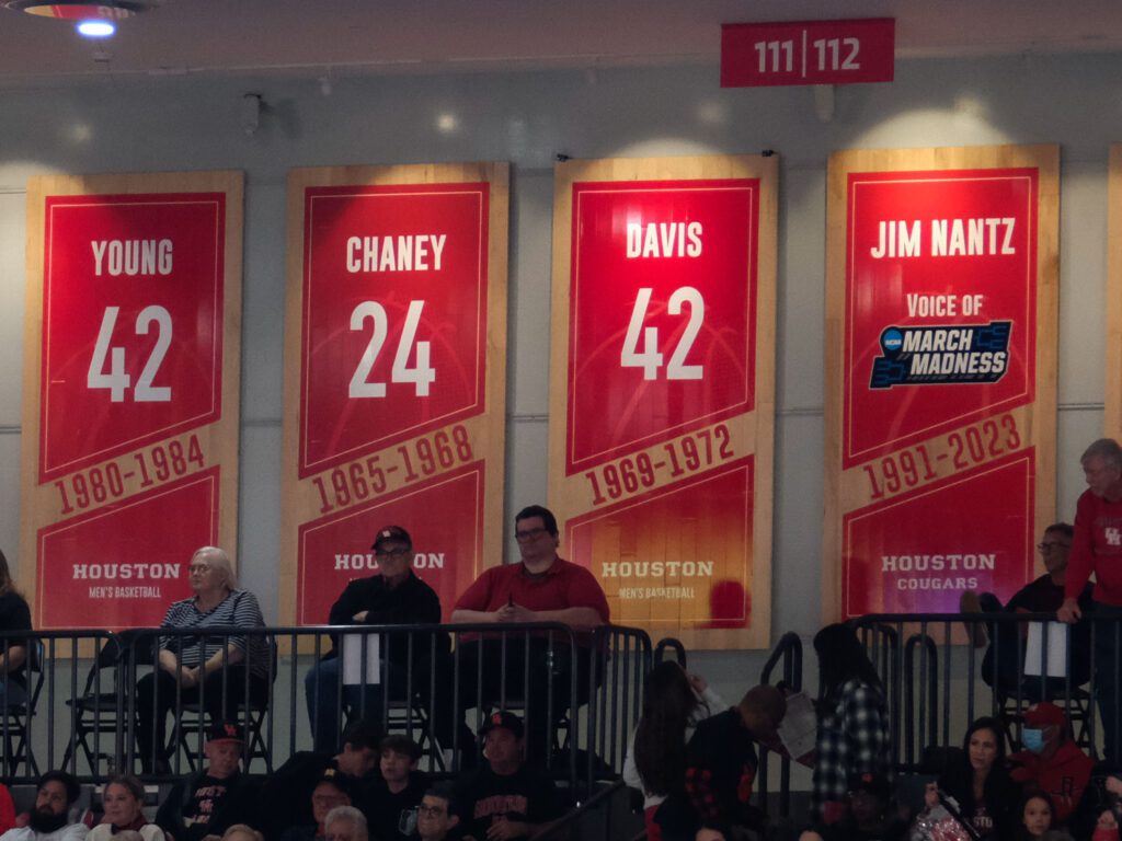 Dwight Davis' No. 42 jersey went on the wall of the Fertitta Center, between Don Chaney and Jim Nantz. A pretty good place to be. (Photo by F. Carter Smith)