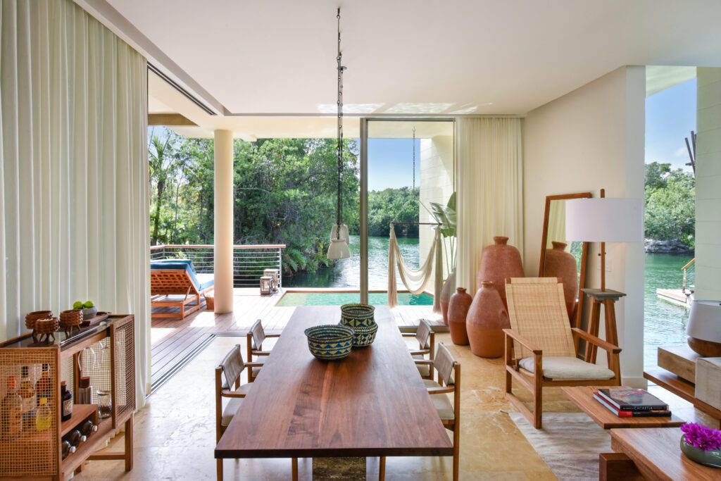 Deluxe Overwater Lagoon Suite's Dining Room (Photo by Rosewood Mayakoba)