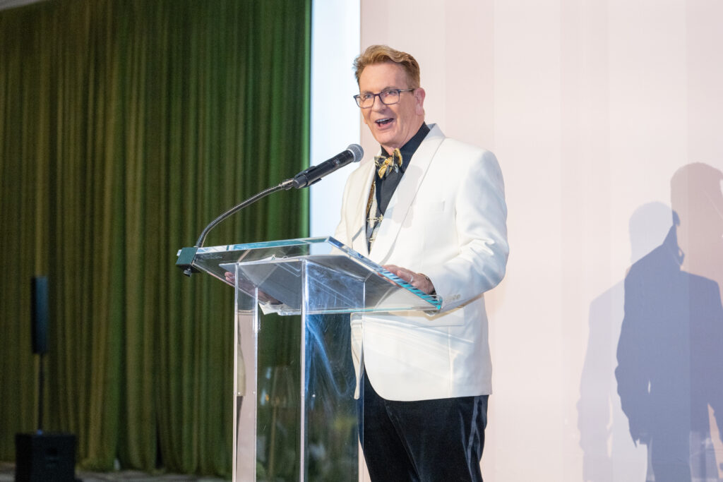 Houston Public Media's Frank Billingsley emcees the Winter Ball (Photo by Jacob Power)