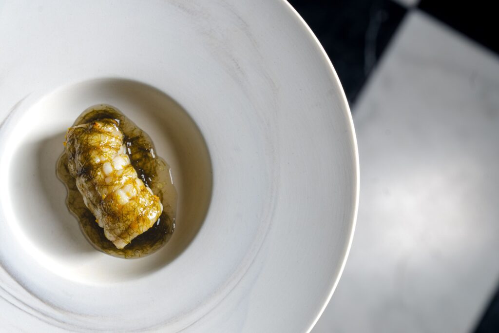 Grilled skate wings are served at the new Oru in The  Heights.