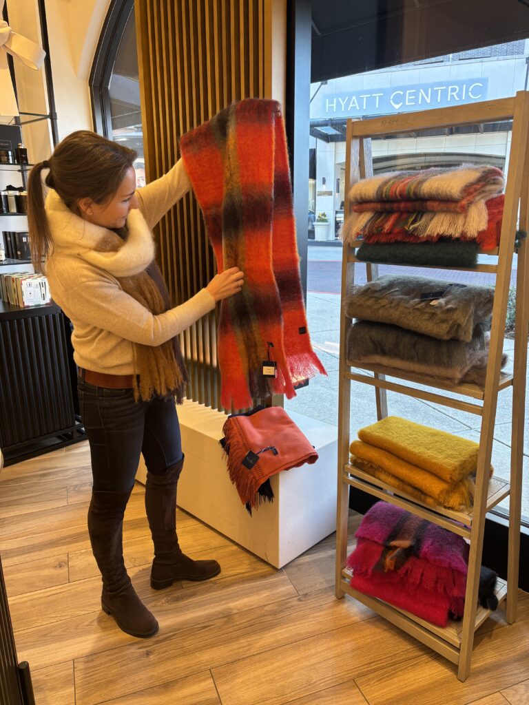 Entrepreneur Vanessa Estebanez styles mohair scarves from Palm & Agave during the Jo Malone pop up. (Photo by Laura Landsbaum)