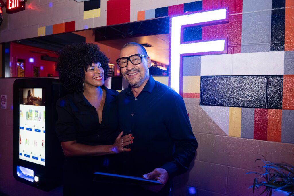 Jasmine Richardson and DJ Sun with The Senate of Texas’ Resolution honoring The Flat for its contributions to the City of Houston