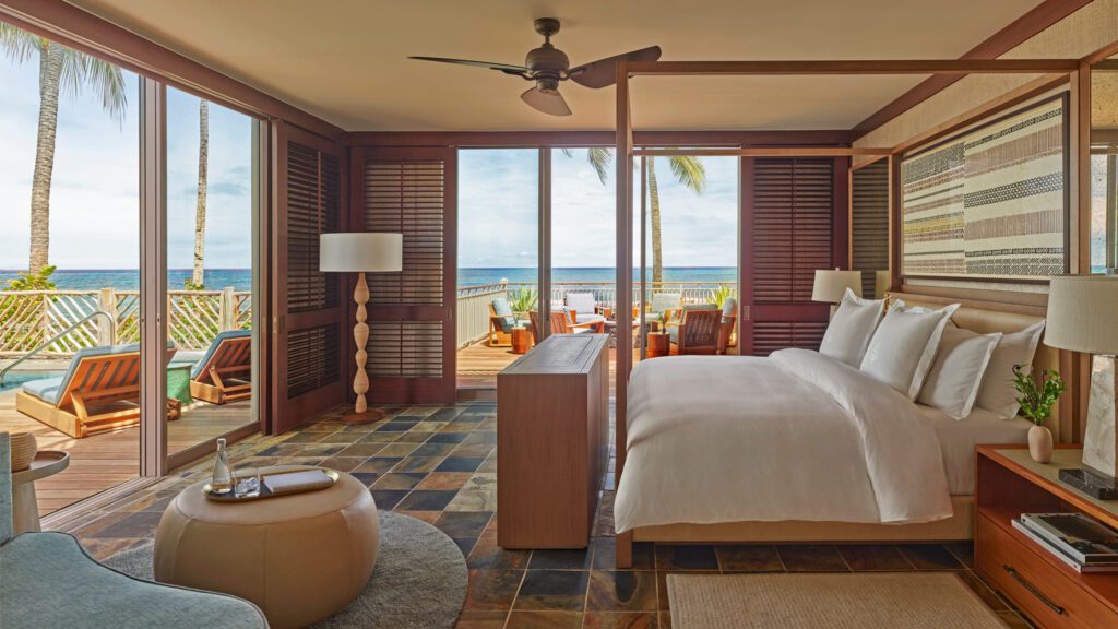 Low-rise bungalows in mid-20th-century Hawaiian style house the majority of the guest rooms, which are well-appointed and luxurious. Pictured, one of 53 suites on the property. (Photo by Four Seasons Resort Hualalai)