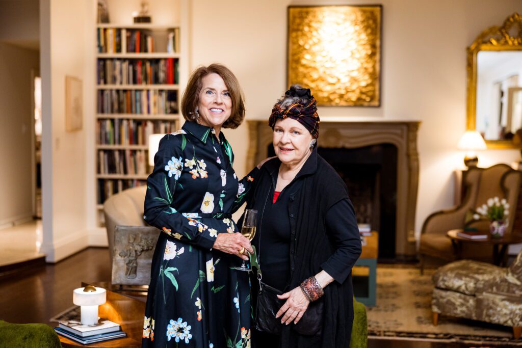 Host Krista Dumas and Martha Claire Tompkins at the Dora Maar Cultural Center celebration.