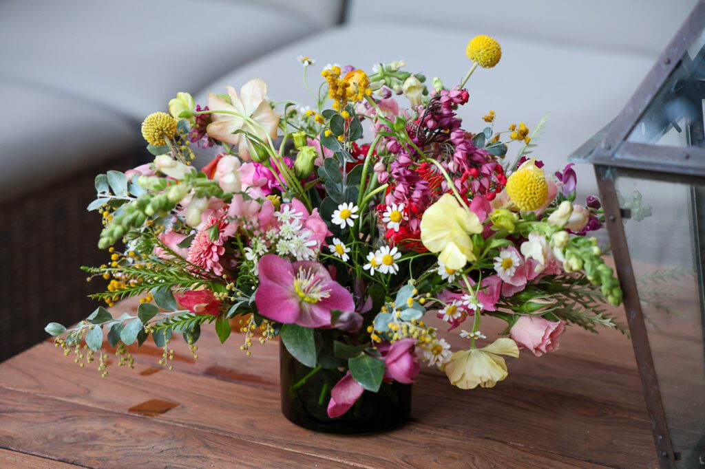 Carroll Wessels' floral talents on display at Christiana Reckling's debut photography show (Photo by Mia Bonner Photography)