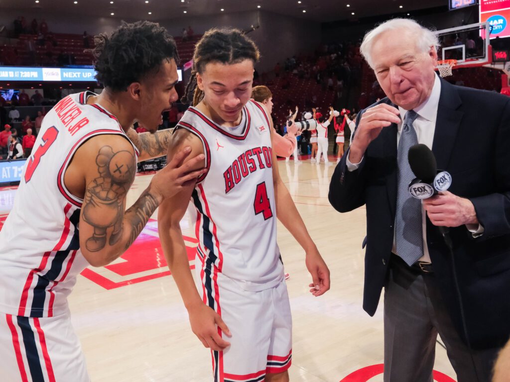 Kingston Flemings took over the game late against Texas Tech, got the Bill Rafferty post game interview and love from teammate Ramon Walker Jr. (Photo by F. Carter Smith)