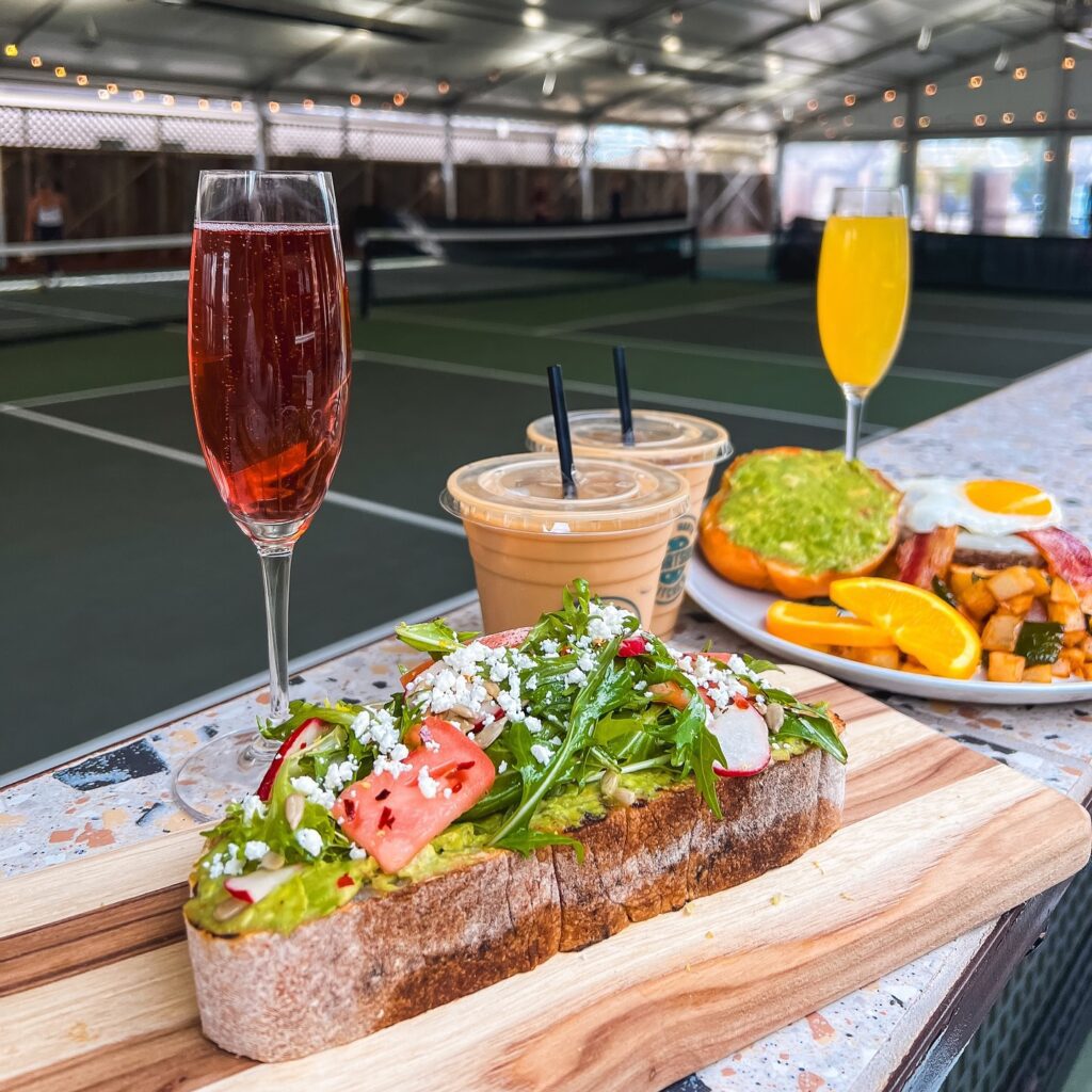 The open-air pickleball courts at Courtside Kitchen remain open as Chef Tim Love and his team prepare to relaunch the indoor restaurant as Meraki, a Mediterranean concept set to debut in February. 