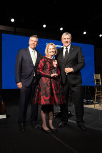 Mike Bahorich (Star of Hope Chair of the Board), Candace L. Caley, and Doug Meikle