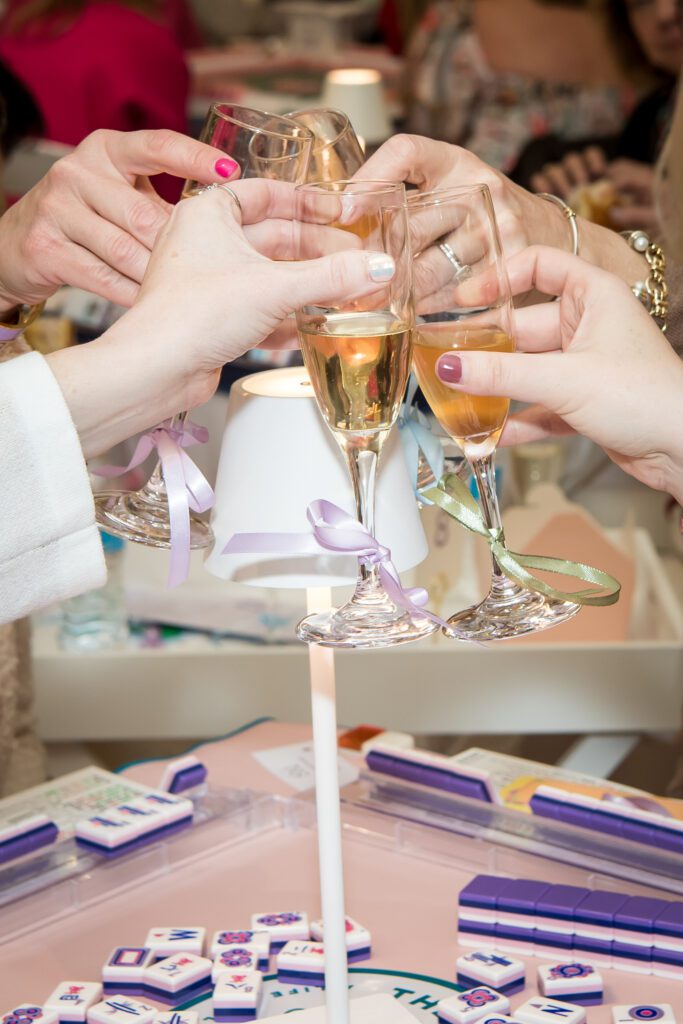As far as bows go, let's say that attendees really tied one on, both sartorially and via the Lallier champagne that hosts could purchase when upgrading their table. (Photo by Kelly Alexander Photography)
