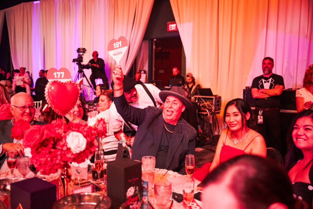 A lively auction helped raise more than $1.2 million to support the nonprofit’s mission of making the arts accessible in the community. (Photo by The Cynthia Woods Mitchell Pavilion)