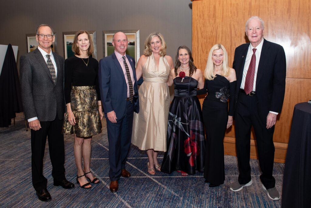 Fred and Kathy Pepper, Jim and Kelley Wolf with Kristine Marlow, Dr. Ann and Jerry Snyder at the "Through the Looking Glass" gala. (Photo courtesy of the Montgomery County Food Bank)